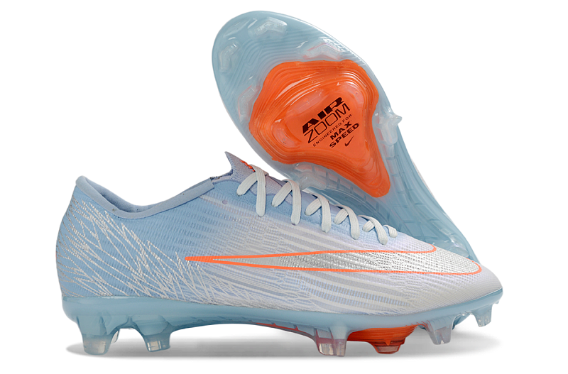 Nike Mercurial Vapor 16 Elite FG en color azul glaciar con detalles en naranja.